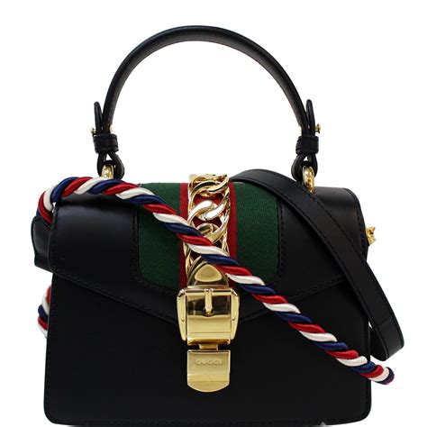 gucci sylvie mini leather clutch|gucci guccissima clutch.